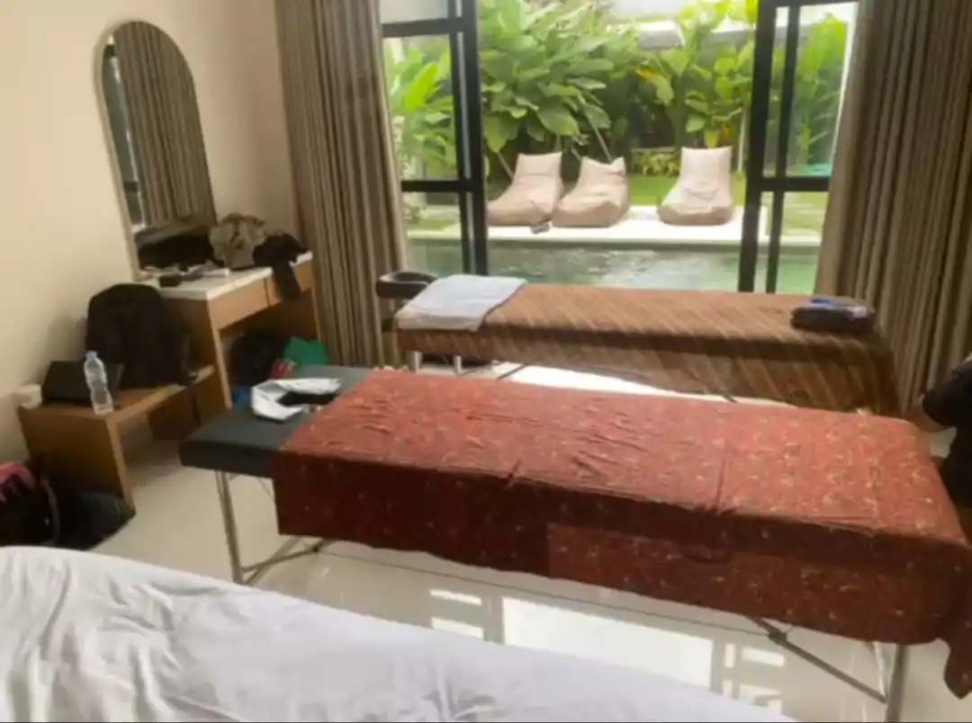 Professional massage therapist providing home massage service in Bali